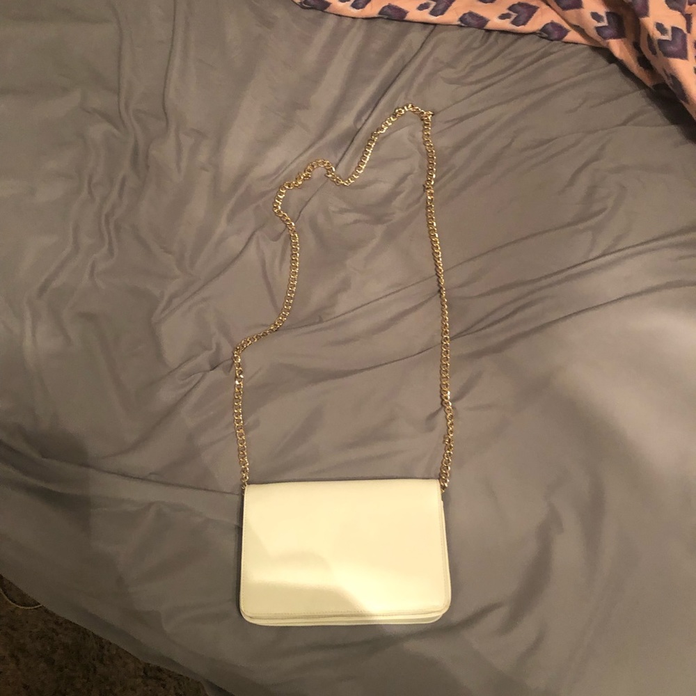 White and gold cross body clutch